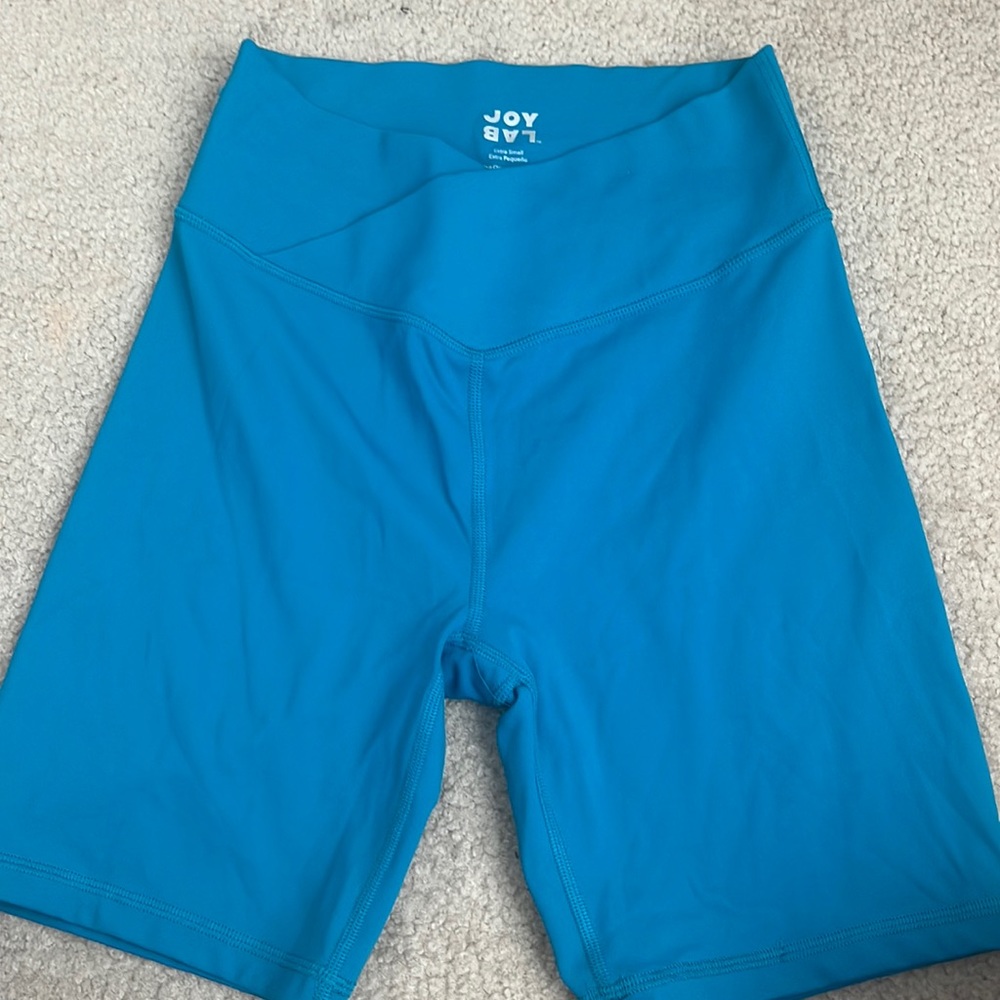 Never worn crossover biker shorts! Pretty blue and supper soft! size xs